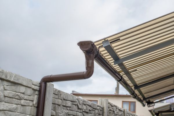 Plastic Downspout Installation in Breckenridge